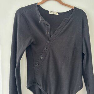 the line by k Evelyn Asymmetrical Henley Bodysuit in black